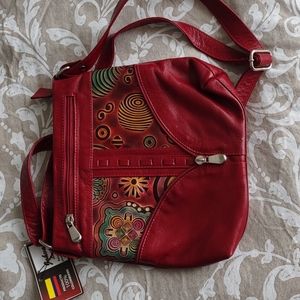 Red leather hand bag.